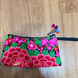 Made in Thailand zip up pouch. Never used